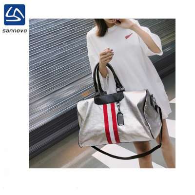 Travel bag female hand luggage  Korean version of the soft leather large capacity travel bag